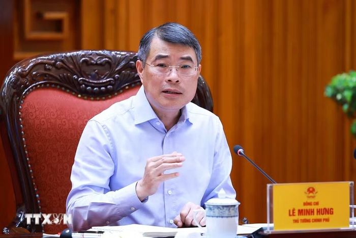 Thủ tướng Lê Minh Hưng chủ trì cuộc họp về phát triển Trung tâm tài chính quốc tế tại Việt Nam. (Ảnh: Dương Giang/TTXVN)