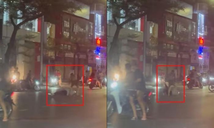 Kẻ côn đồ cầm hung khí tấn công một phụ nữ. Ảnh: VTC News.