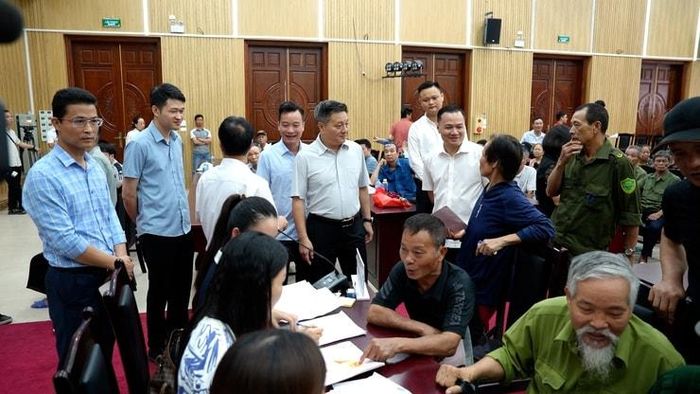 Công tác chi trả, bồi thường cho người dân để thực hiện Dự án đầu tư xây dựng Khu đô thị thể thao Olympic được lãnh đạo xã quan tâm. Ảnh: PV
