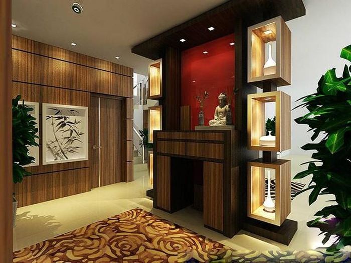 Cây xanh và đèn thờ là những yếu tố giúp bàn thờ thêm cân đối và trang nghiêm. Gia chủ có thể đặt chậu cây nhỏ như trầu bà, lưỡi hổ hoặc phát lộc gần khu vực thờ.