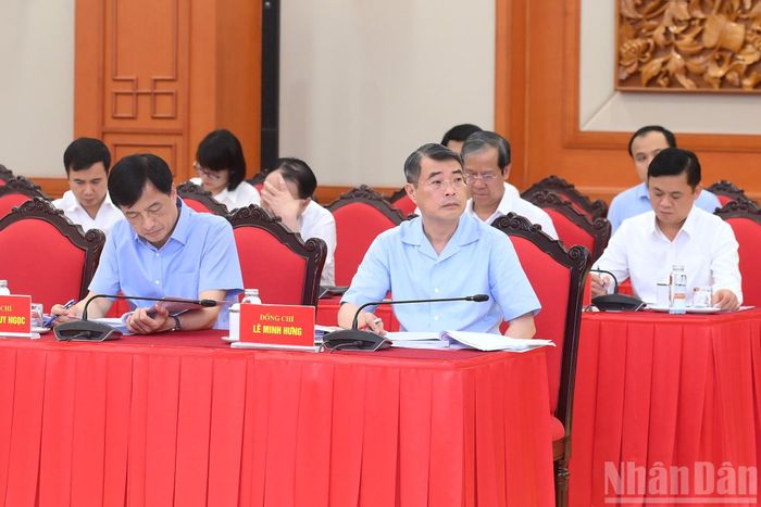  Các đại biểu tham dự cuộc làm việc. Ảnh: NHÂN DÂN 
