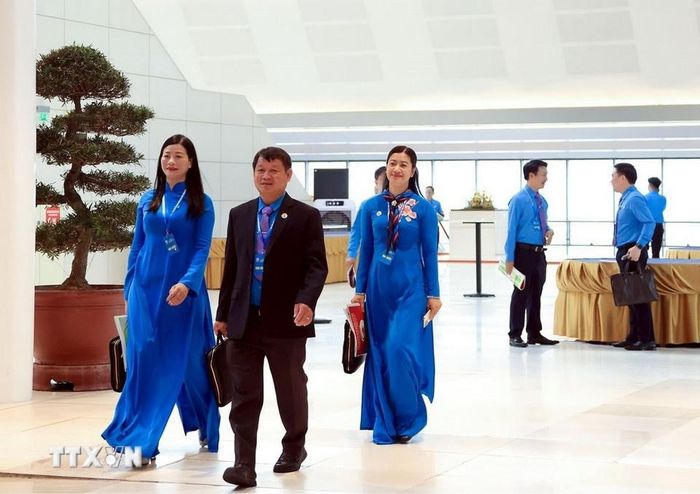  Các đại biểu đến dự Phiên làm việc trọng thể Đại hội XIV Công đoàn Việt Nam. 