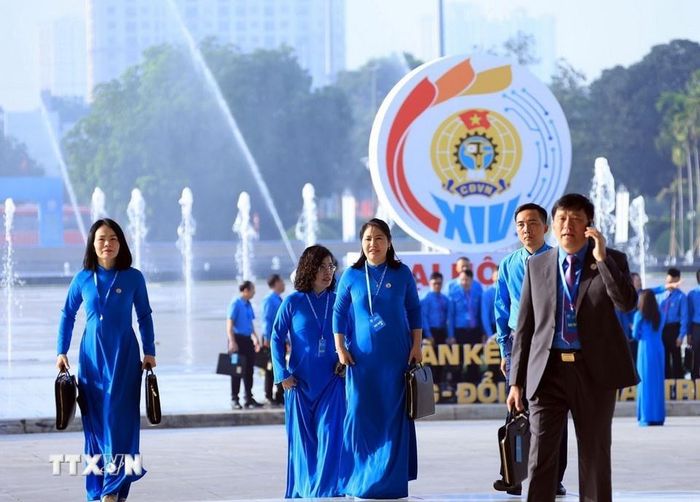 Các đại biểu đến dự Phiên làm việc trọng thể Đại hội XIV Công đoàn Việt Nam. 