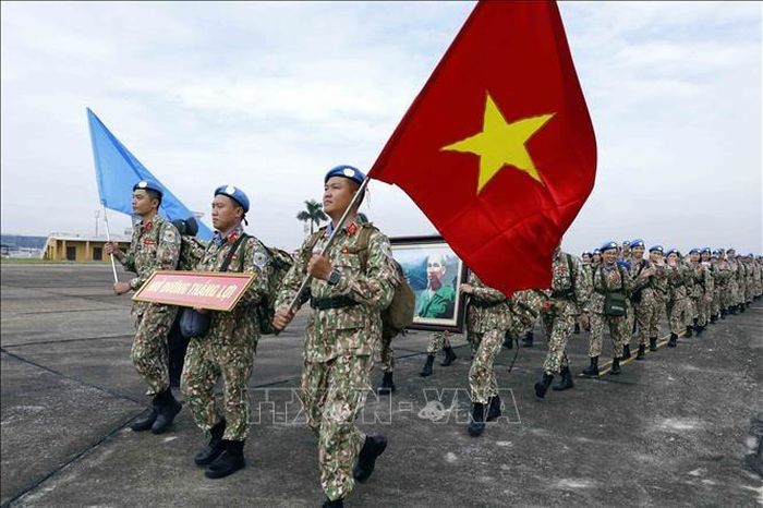 Lực lượng gìn giữ hòa bình Việt Nam xuất quân tại Sân bay quốc tế Nội Bài (Hà Nội), lên đường thực hiện nhiệm vụ của Liên Hợp Quốc tại Phái bộ UNISFA, ngày 8/8/2023. Ảnh: TTXVN