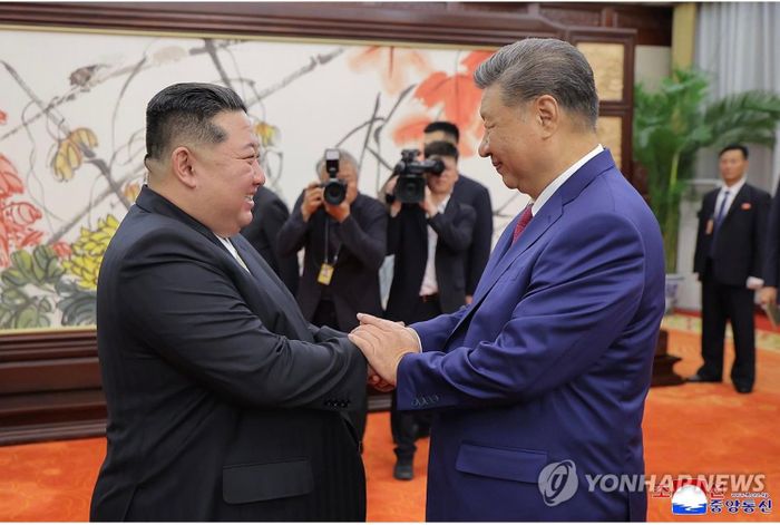 Ông Kim Jong Un và ông Tập Cận Bình. Ảnh: KCNA