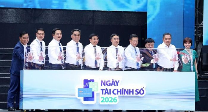 Phó Thủ tướng Nguyễn Văn Thắng và các đại biểu thực hiện nghi thức khai mạc Lễ hội Tài chính số 2026 - Ảnh: VGP/Đức Tuân