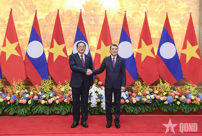  Thủ tướng Lê Minh Hưng và Thủ tướng Lào Sonexay Siphandone. Ảnh: TUẤN HUY 