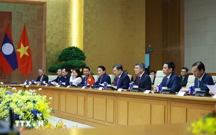 Thủ tướng Lê Minh Hưng hội đàm với Thủ tướng nước Cộng hòa Dân chủ Nhân dân Lào Sonexay Siphandone. (Ảnh: Dương Giang/TTXVN)