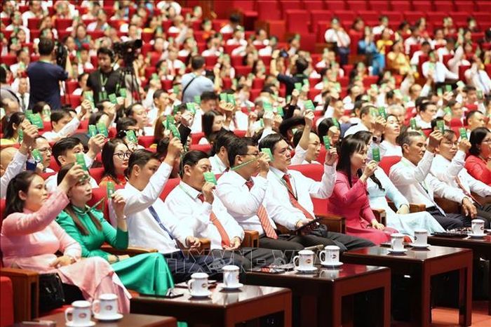 Các đại biểu biểu quyết thông qua Chương trình Đại hội. Ảnh: Hoàng Hiếu/TTXVN