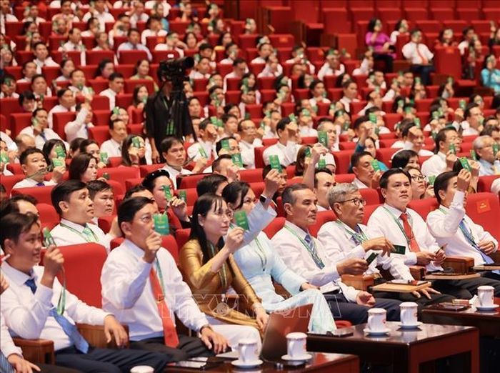 Các đại biểu biểu quyết Đề án nhân sự Ban Chấp hành Hội Nông dân Việt Nam khóa IX, nhiệm kỳ 2026 - 2031. Ảnh: Hoàng Hiếu/TTXVN.