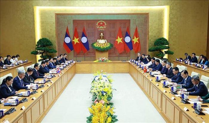 Thủ tướng Lê Minh Hưng hội đàm với Thủ tướng nước Cộng hòa Dân chủ Nhân dân Lào Sonexay Siphandone. Ảnh: Dương Giang/TTXVN.
