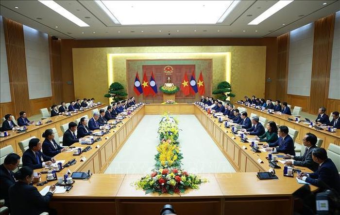 Thủ tướng Lê Minh Hưng hội đàm với Thủ tướng nước Cộng hòa Dân chủ Nhân dân Lào Sonexay Siphandone. Ảnh: Dương Giang/TTXVN.