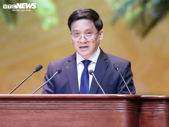 Ông Phạm Tiến Nam, Phó Chủ tịch Ban Chấp hành Trung ương Hội khóa VIII, Trưởng Ban Thẩm tra tư cách đại biểu, trình bày báo cáo kết quả thẩm tra tư cách đại biểu dự Đại hội đại biểu toàn quốc Hội Nông dân Việt Nam lần thứ IX, nhiệm kỳ 2026-2031.