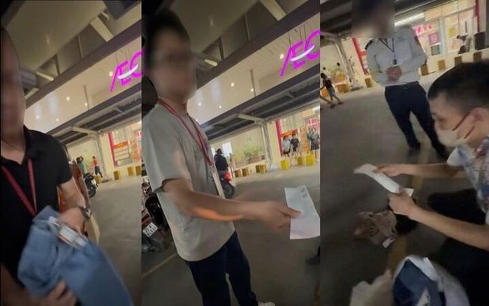 Nhân viên Aeon Mall nghi ngờ khách hàng ăn cắp đồ. Ảnh cắt từ clip.