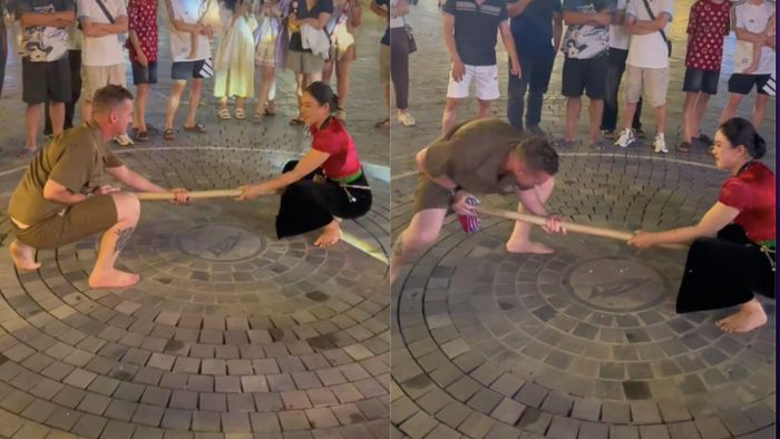 Màn thi đấu thú vị giữa chàng du khách Tây và cô gái dân tộc Thái ở Mộc Châu. (Ảnh chụp màn hình)