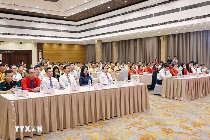 Chủ tịch Quốc hội Trần Thanh Mẫn và đại biểu dự Lễ tôn vinh người hiến máu tình nguyện tiêu biểu toàn quốc năm 2026. (Ảnh: Doãn Tấn/TTXVN)