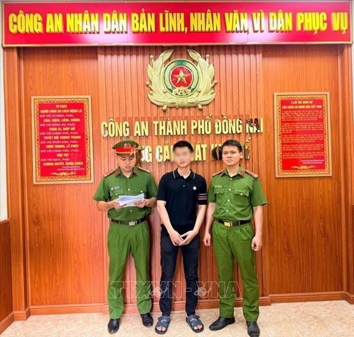 Đối tượng Vũ Văn Hà H. tại cơ quan điều tra. Ảnh: TTXVN phát
