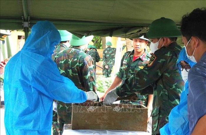 Toàn bộ quy trình đều được tiến hành chặt chẽ, khoa học và trang nghiêm. Ảnh: TTXVN phát
