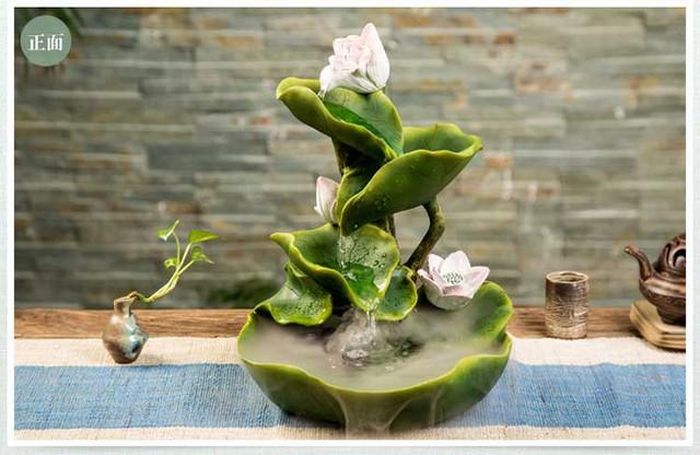Khi bài trí thác nước phong thủy cần chú ý tới hướng nước chảy. Ảnh TL