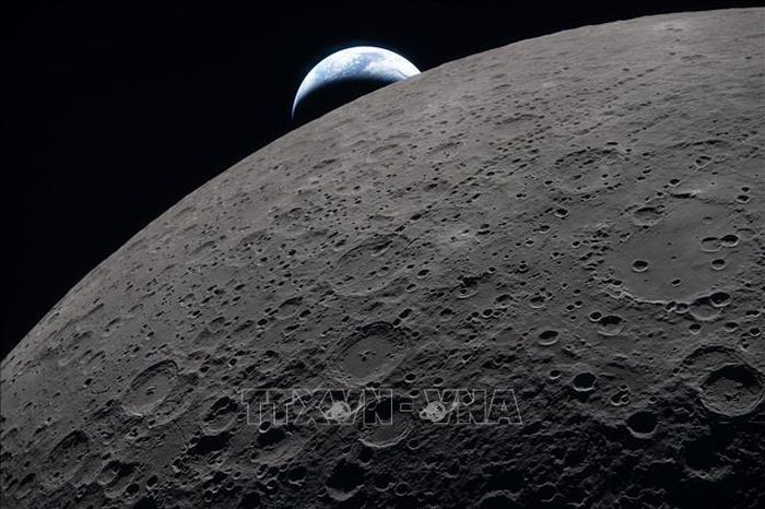 Hình ảnh Mặt Trăng và Trái Đất được quan sát từ tàu vũ trụ Orion trong sứ mệnh Artemis II, ngày 6/4/2026. Ảnh tư liệu: THX/TTXVN