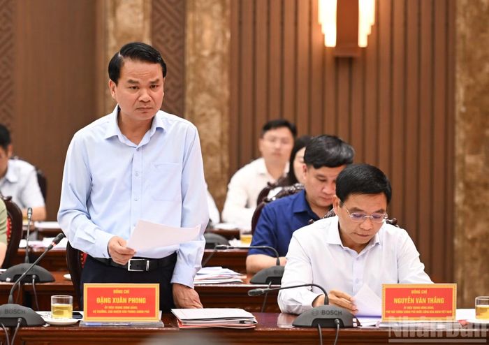Bộ trưởng, Chủ nhiệm Văn phòng Chính phủ Đặng Xuân Phong phát biểu tại cuộc làm việc.