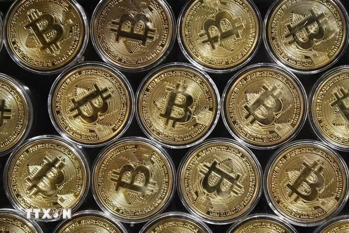 Đồng tiền kỹ thuật số bitcoin. (Ảnh: AFP/ TTXVN)