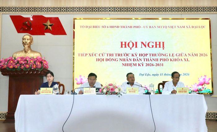 Tổ đại biểu số 6 HĐND thành phố tiếp xúc cử tri xã Đại Lộc. Ảnh: QUỐC TUẤN