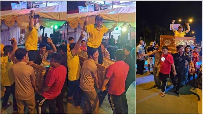 Các đối tượng khiêng quan tài diễu hành và nhảy múa giữa đường phố.