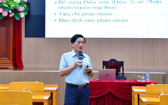 Phó Vụ trưởng Vụ Pháp chế Huỳnh Hữu Thọ trao đổi tại Hội nghị. Ảnh: Đ. KHOA