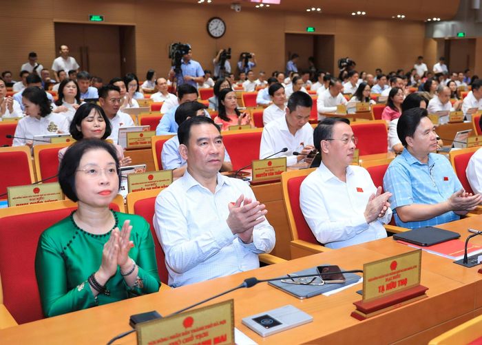 Đại biểu tham dự phiên khai mạc kỳ họp. Ảnh: Thành Thái