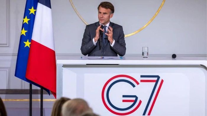 Tổng thống Pháp Emmanuel Macron nỗ lực duy trì sự đoàn kết trong G7 giữa căng thẳng địa chính trị và thương mại gia tăng. Ảnh: Agefi.
