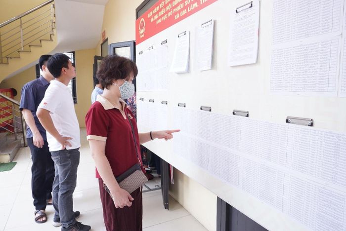Tại các nhà văn hóa, nội dung Đề án được niêm yết công khai để người dân nghiên cứu, tìm hiểu, đóng góp ý kiến. Ảnh: Hoàng Anh