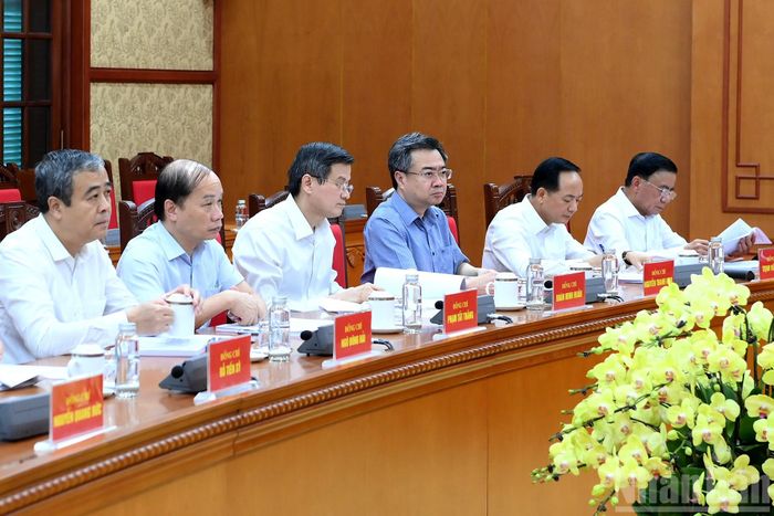 Các đại biểu tham dự tại buổi làm việc. Ảnh: NHÂN DÂN