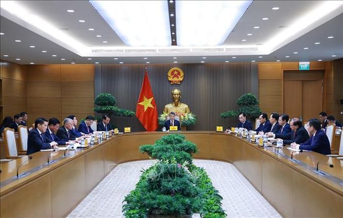 Thủ tướng Chính phủ Lê Minh Hưng điện đàm với Thủ tướng Trung Quốc Lý Cường. Ảnh: Dương Giang/TTXVN