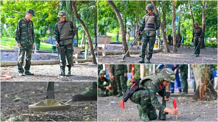Kiểm tra, dò gỡ các thiết bị, vật liệu nổ trước khi bàn giao mặt bằng cho đơn vị khảo sát. Ảnh: MẠNH THẮNG