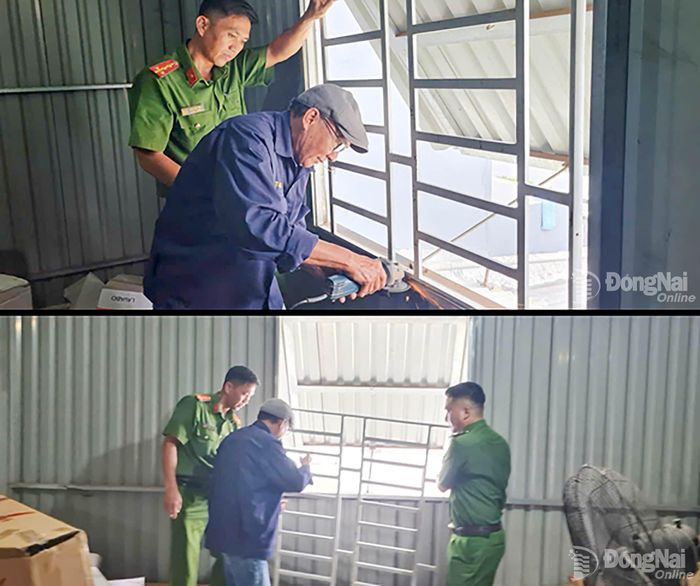 Một nhà dân tiến hành tháo dỡ khung sắt để mở lối thoát nạn thứ hai