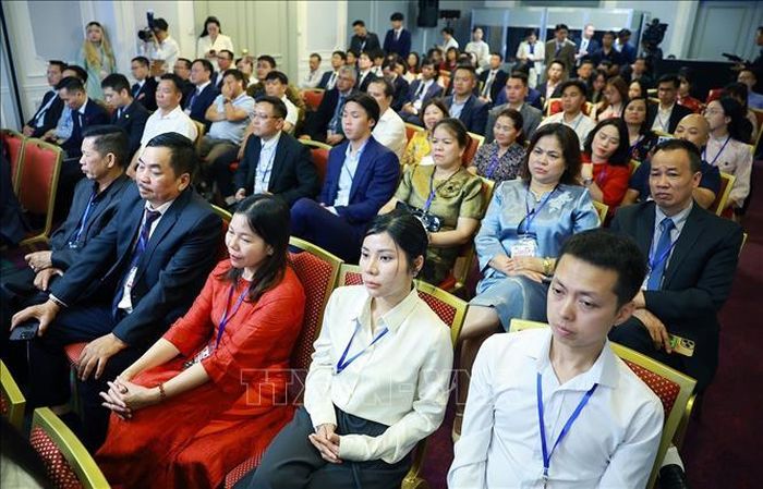 Cộng đồng người Việt Nam tại Liên bang Nga tham dự buổi gặp. Ảnh: Dương Giang/TTXVN