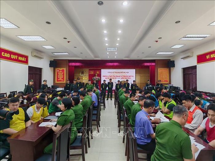 Các đối tượng tại cơ quan Công an. Ảnh: TTXVN phát
