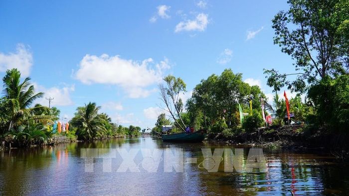 Khu vực khởi công xây dựng cầu Thiện nguyện Phước An Minh bắc qua kênh Lâm Trường. Ảnh: Văn Sĩ - TTXVN