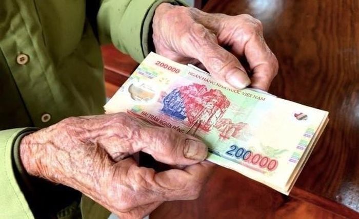 Với hình thức nhận tiền mặt, việc chi trả tại các điểm chi trả sẽ diễn ra từ ngày 2 đến 10/7. Ảnh minh họa.