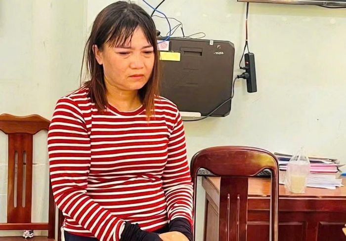 Thái Thị Hoàng Oanh tại thời điểm áp giải đi chấp hành án phạt tù. Ảnh: CAĐL.