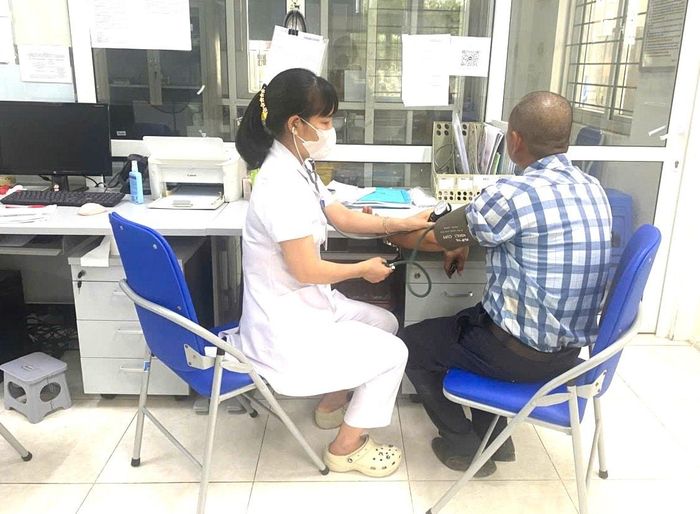 Người dân đến khám sức khỏe tại Trạm Y tế phường Thanh Liệt. Ảnh: Trạm Y tế phường Thanh Liệt