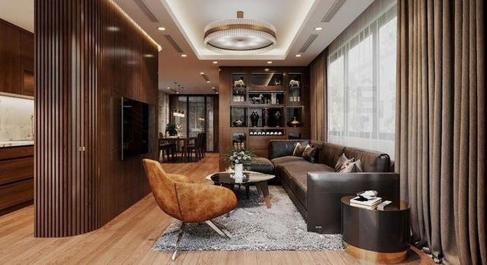 Không gian phòng khách liền bếp nổi bật với gam màu nâu của gỗ ấm áp, hiện đại.