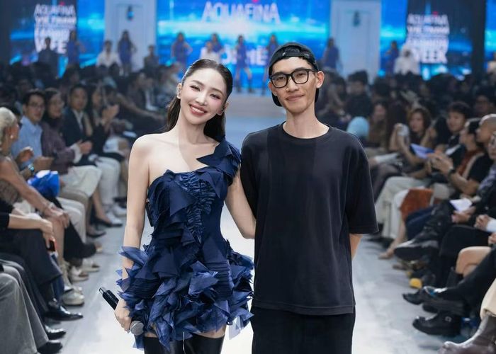 Ca sĩ Tóc Tiên và NTK Tom Trandt trong show diễn của thương hiệu Môi Điên tại đêm khai mạc