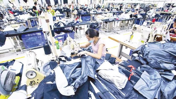 Sản xuất hàng xuất khẩu tại Công ty TNHH May Kido, tỉnh Hưng Yên. (Ảnh: TUỆ NGHI)