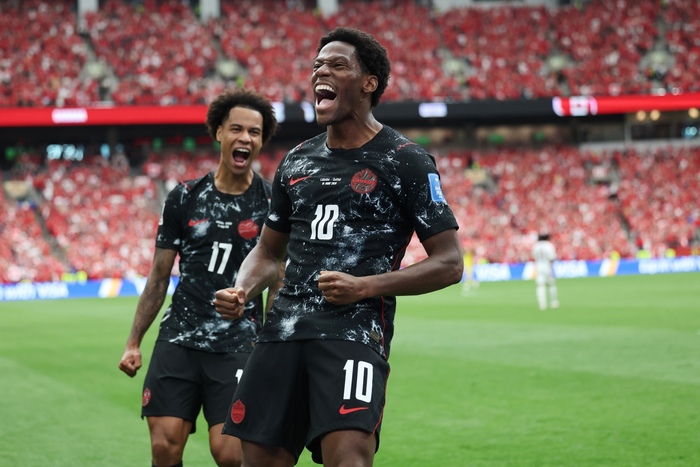 Sau Lionel Messi (Argentina), Jonathan David (số 10) đã lập hat-trick (3 bàn) cho Canada. Ảnh: AP