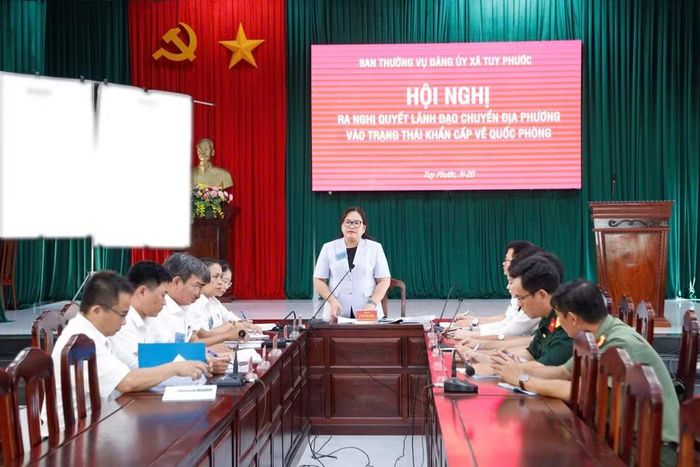 Một hội nghị trong phần vận hành cơ chế diễn tập tác chiến xã Tuy Phước. Ảnh: H.P