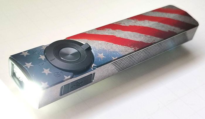 The Olight ArkPro Stars & Stripes flashlight outputs 1,500-lumen from its floodlight.