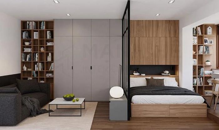 Phòng ngủ liền phòng khách được ngăn cách bằng vách ngăn mỏng vừa tạo sự riêng tư vừa tối ưu diện tích.
