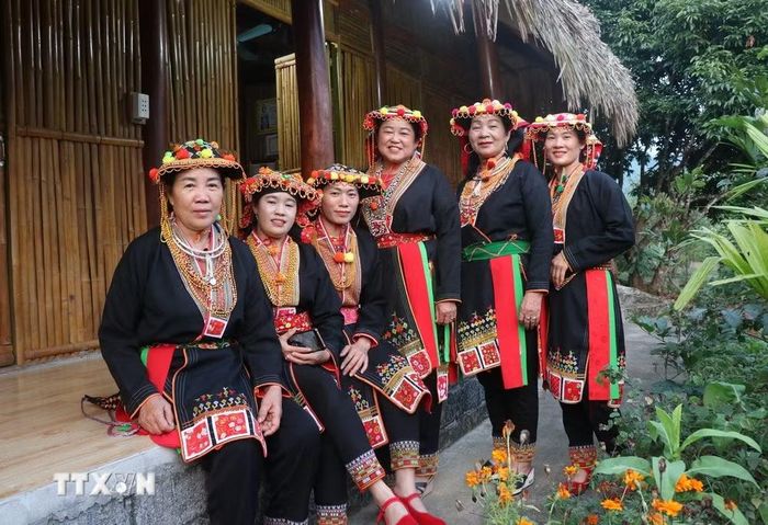 Phụ nữ Dao ở Tây Yên Tử mặc trang phục truyền thống. (Ảnh: Thanh Thương/TTXVN)